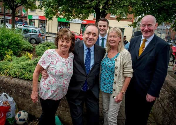 Former First Minister of Scotland, Alex Salmond MP, met some local voters during his visit to the city on Friday. Included is SDLP Leader Colum Eastwood MLA and Mark Durkan MP.