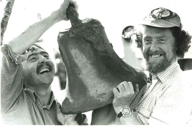 Des and Ray Cossum pictured with the Laurentic bell during a salvage operation on the Allerton in 1979.