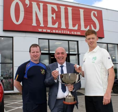 Pictured making the draw for the O'Neills Ulster Cup and Shield are from left, David Bradley of the NW, Kieran Kennedy, MD O'Neills, and Irish international Craig Young.