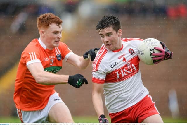 Derry's Conor Doherty in action against Armagh's Jason Duffy  during the Electric Ireland Ulster GAA Football Minor Championship semi-Final at St Tiernach's Park. (. Photo by Oliver McVeigh/Sportsfile)