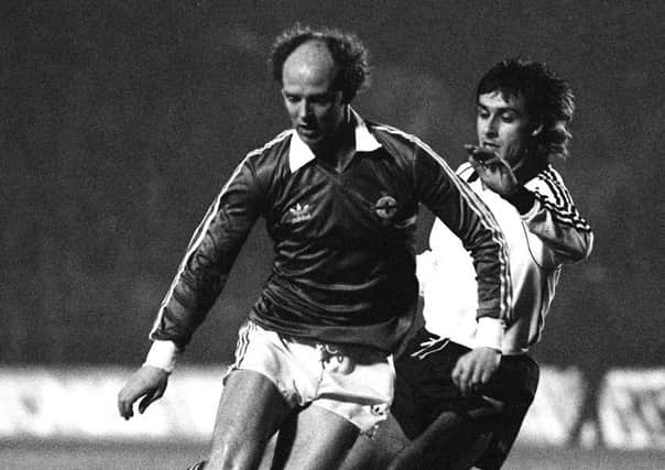 Northern Ireland V Germany 17th November 1982 
Noel Brotherston rounds a German defender during the 1982 game