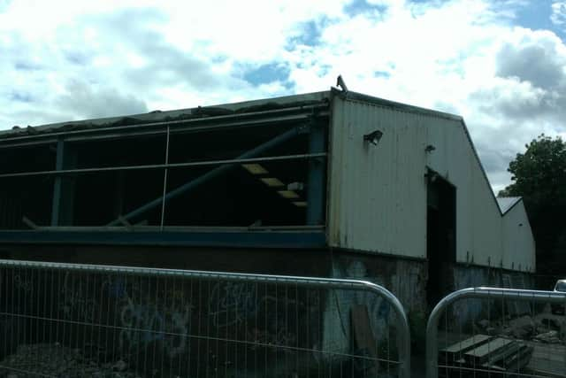 Panels removed as work gets under way at the former Budget DIY store site, 10 years after it closed. The site is to become a new Home Bargains flagship store.