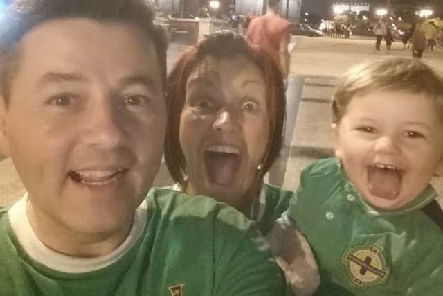Alan and Tracy  Robinson from Limavady and their two and half years old daughter, Sienna in Paris when they found out Northern Ireland were through to the last 16 in Euro 2016.