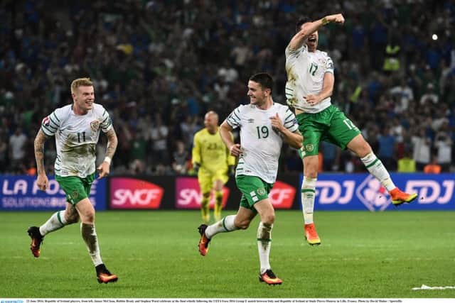 Republic of Ireland players, from left, James McClean, Robbie Brady and Stephen Ward celebrate at the final whistle following the UEFA Euro 2016 Group E match against Italy.