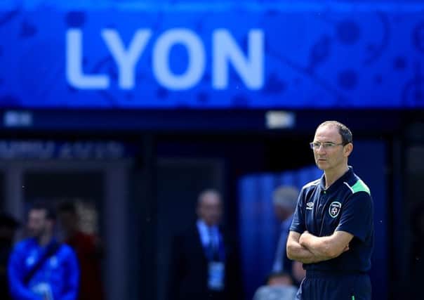 Republic of Ireland Manager Martin O'Neill
watches his team training