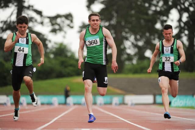 Jason Smyth, Derry City Track Club, on his way to winning the Men's 100m with Jonathan Browning, left, Ballymena & Antrim AC and Dean Adams, right, Ballymena & Antrim AC, during the GloHealth National Senior Track & Field Championships at Morton Stadium in Santry, Co Dublin. Photo by TomÃ¡s Greally/Sportsfile