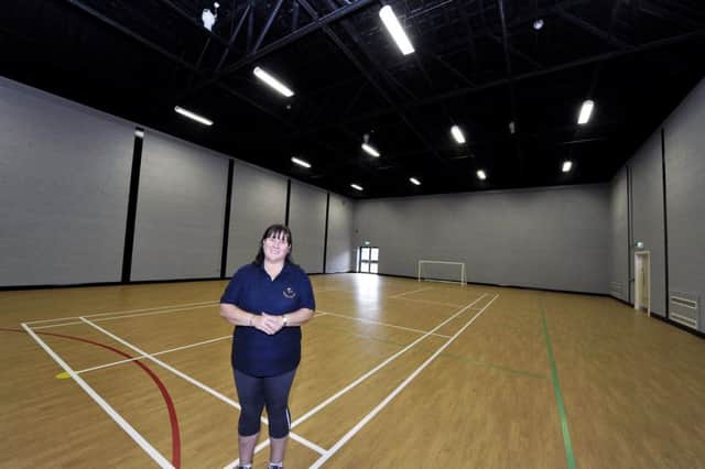 Annemarie Bell Leader in Charge pictured in the newly refurbished sports hall in Pennyburn Youth Club. DER2616GS016