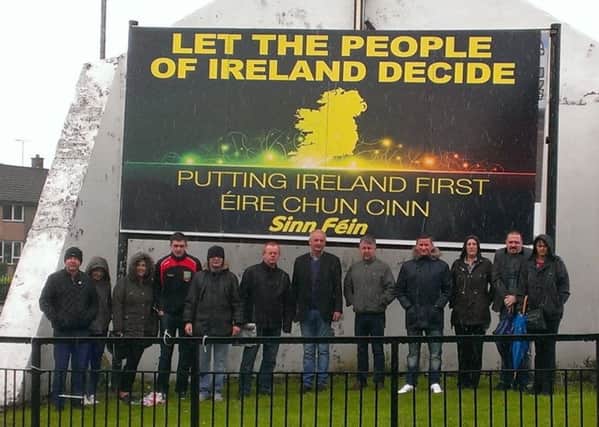 Sinn Fein members pictured at the launch of the 'Let the People of Ireland Decide' billboard at Free Derry Corner on Monday.