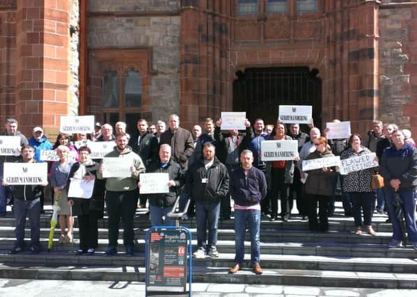 Protestors gathered outside the Guildhall while a Community Planning event was staged inside.