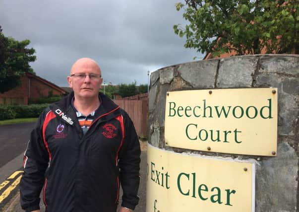 Sinn Fein Councillor, Kevin Campbell pictured outside Beechwood Court.