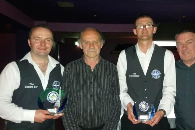Adrian McFadden (left), a double champion in this season's North-West Snooker Championships, pictured following his victory in the Alfie McGinley Premier Individual League play-off final. Also included are Hugh Brady, jun (tournament organiser), Phelim McClafferty (runner-up) and Joe Sims (referee).