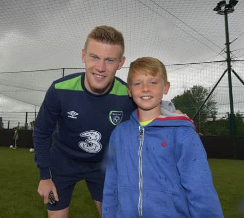 Ethan McClelland pictured with Republic of Ireland star James McClean at the Meet Your Hero fans event held at Bay Road Soccer on Friday afternoon last. DER2616GS062