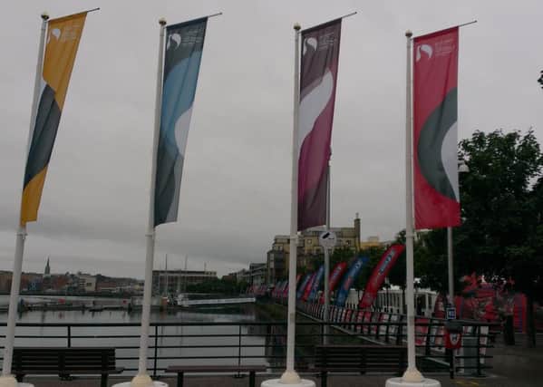 Flags lining the quay ahead of the Clipper fleet arriving.