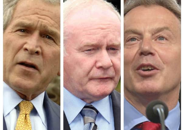 From left to right, former U.S. President, George W. Bush, Sinn Fein MLA for Foyle, Martin McGuinness and former British Prime Minister, Tony Blair.