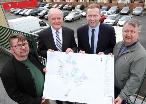 Infrastructure Minister Chris Hazzard with deputy First Minister Martin McGuinness, Colm Barton, Bogside & Brandywell Initiative, and Charles Lamberton, TRIAX Neighbourhood Partnership, during his visit to the Bogside, to announce details of the new Residents' Parking Scheme. Photo Lorcan Doherty Photography