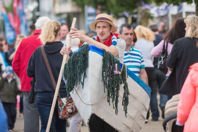 One of the street characters finds himself on dry land with his rowing boat during the week long Foyle Maritime Festival which started at the weekend. Picture Martin McKeown. Inpresspics.com. 09.07.16