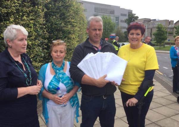 Lorraine McBride (far right), pictured with Susan Keaton, Crona Ward and Matt Fitzgerald as they handed over the petition at St Vincent's University Hospital last Thursday.