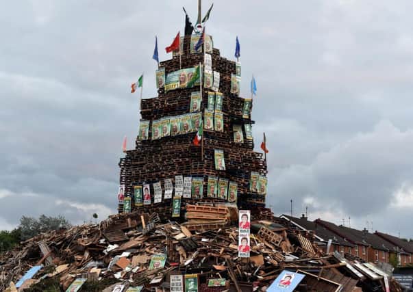 The 11th Night bonfire at Edgarstown, covered in at least 30 Sinn Fein and SDLP election posters. This follows a complaint to police about another bonfire in Portadown's Corcrain Estate at the weekend as a hate crime by Sinn Fein.