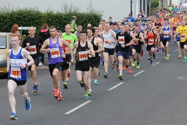 City of Derry Spartans' Declan Reed and Foyle Valley's Chris McGuinness are well placed at the front of the pack at the Rathmullan 5k.