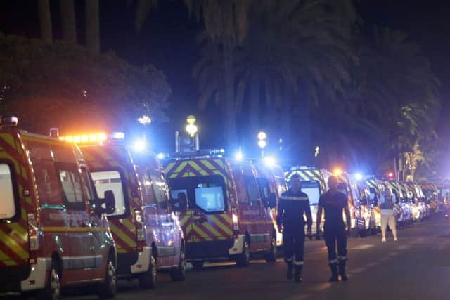 Ambulances line up near the scene of the attack (AP)