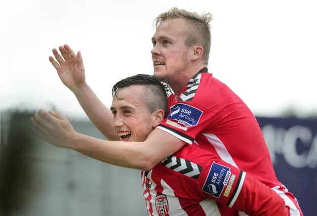 Derry City's Aaron McEneff celebrates his penalty against Longford Town with Conor McCormack at the Brandywell. Picture by Margaret McLaughlin.