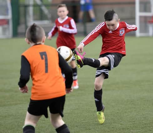 Torin McGlynn fires in a shot at goal for Maiden City during their under-10's match against Corinthians. INLS2916-140KM