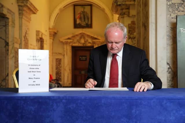 The deputy First Minister Martin McGuinness pictured signing a book of condolence in Belfast City Hall for those who lost their lives in Nice in the recent attack.

Picture by Kelvin Boyes / Press Eye.