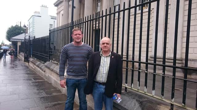 Eamon O'Donnell and Paul Hughes outside Bishop Street Courthouse after they were cleared of obstructing a road.