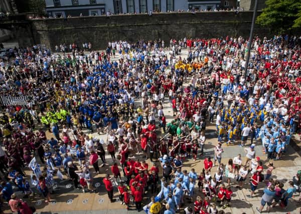 The massive sea of colour in Guildhall Square on Tuesday afternoon as the Hughes Insurance Foyle Cup parade descended.