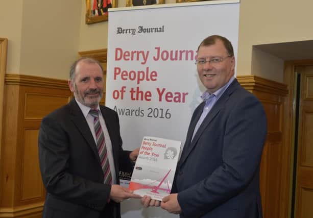Derry Journal editor, Arthur Duffy pictured with Stephen Gillespie ,Director of Business & Culture, Derry City & Strabane District Council in the Guildhall at the launch of the Derry Journal People of the Year Awards 2016. DER2016GS010