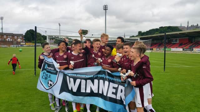 Hearts celebrate their Under-16 Foyle Cup success.