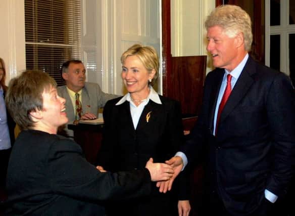 Patsy OKane, on left, welcomes Hillary and Bill Clinton to the Beech Hill Hotel back in the summer of 2004.