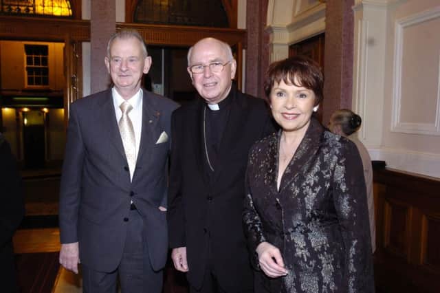 Dr Tom McGinley pictured with Bishop Daly.