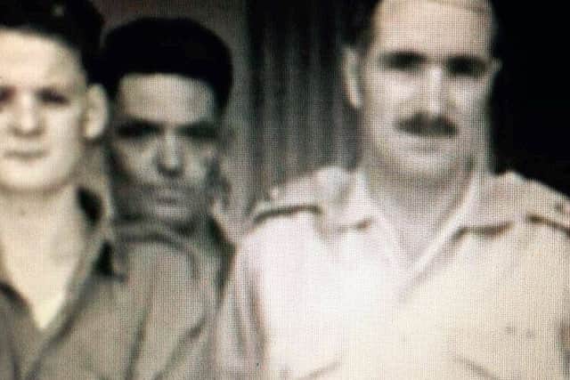 Derry man Johnny McAnnaney is pictured in the centre-to his right is Commandant Pat Quinlan.