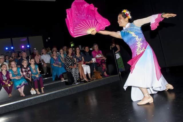 Chinese Fan Dance performer Weihong Tu entertaining the audience at Friday night's 'Celebrating Diversity and Friendship' Multicultural Evening at the new Studio 2 in Skeoge. (Photos: Jim McCafferty Photography)