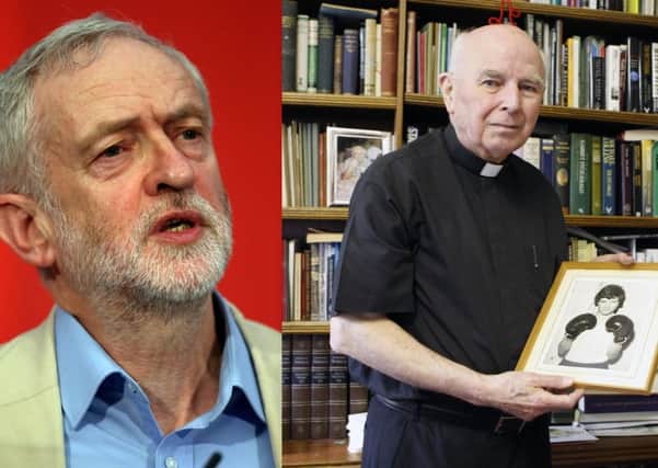 Jeremy Corbyn has paid tribute to Dr Daly, pictured here with a photo of Bloody Sunday victim Jackie Duddy.