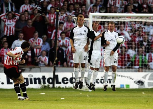 Derry City's Kevin Deery scores his teams second goal during the UEFA Cup second qualifying round first leg match against Gretna at Fir Park, Motherwell.