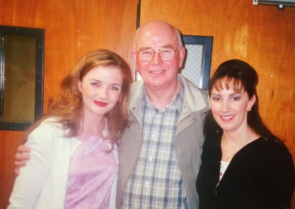 Bishop Daly pictured centre in Florida in 1999 with two Derry women who starred in Riverdance at the time. On the left is lead singer Jennifer Curran and on the right is champion Irish dancer, Joanne Evans.