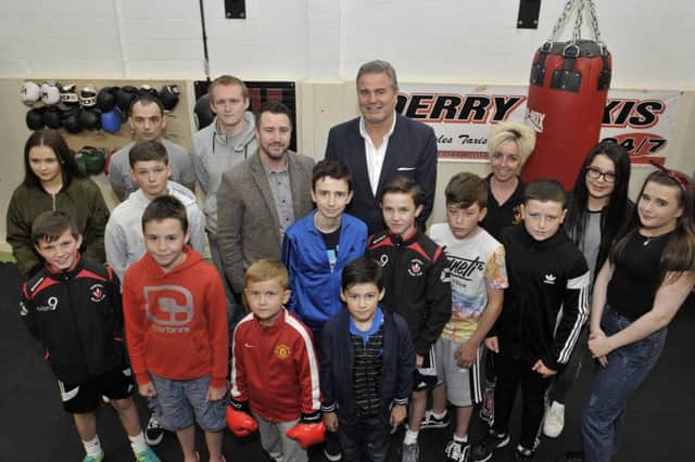 Former IBF world cruiserweight champion and TV pundit Glen McCrory (centre) pictured with club members at the official opening of Oak Leaf Boxing Clubs new facilities at Rath Mor Business Park on Wednesday night.  DER3216GS051