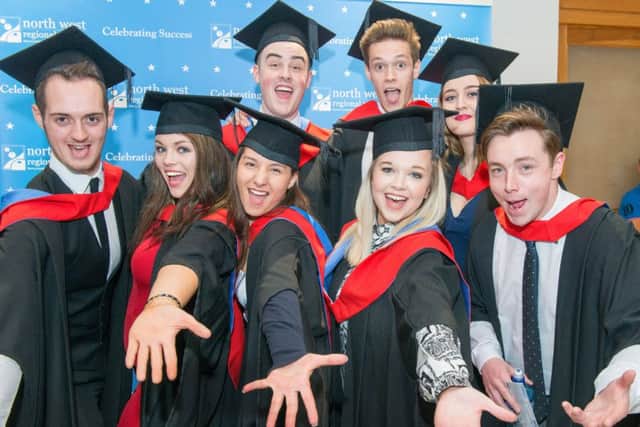 Students celebrate after they graduated from the NWRC at the Autumn Graduations in the Millennium Forum. Picture Martin McKeown. Inpresspics.com.