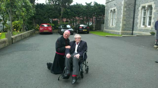 Bishop of Derry Donal McKeown with veteran Civil Rights leader Ivan Cooper at the funeral of Bishop Daly.