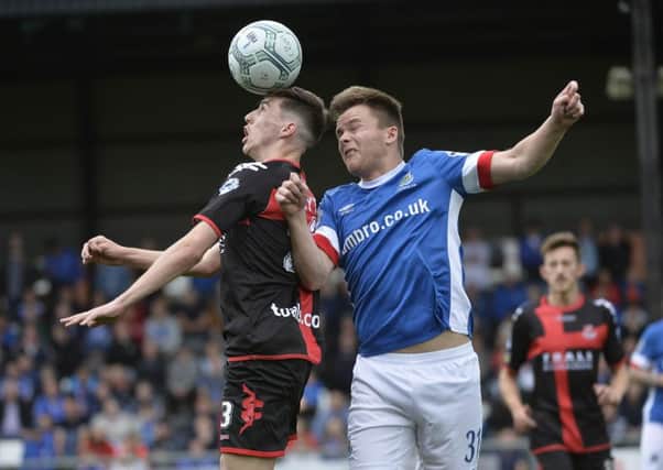 Crusaders winger Gavin Whyte in action with Linfield's Niall Quinn