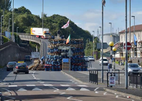 A large bonfire constructed mainly of pallets at the bottom of the Lecky Road flyover in Derry. Photo; George Sweeney