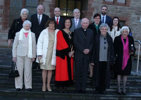 Betty Doherty, (front row, far left) at the Guildhall with Bishop Edward Daly and his family and former Mayor of Derry,  Brenda Stevenson, before the Conferring of the Freedom of the City on Bishop James Mehaffey and Bishop Daly.