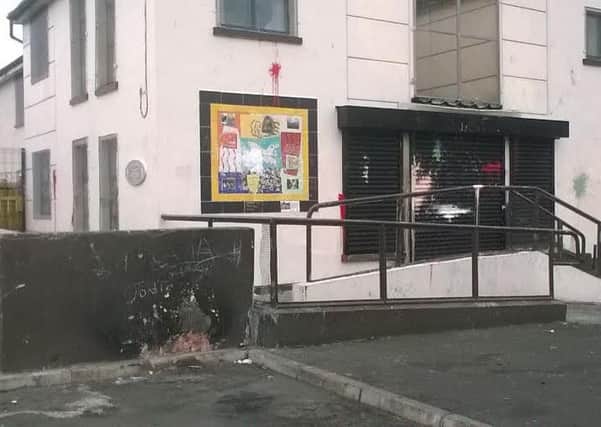 Petrol and paint bombs were fire at Dove House in Derry.