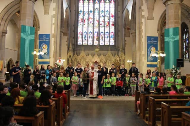Young people pictured with Bishop of Derry Donal McKeown at St Eugene's Cathedral.