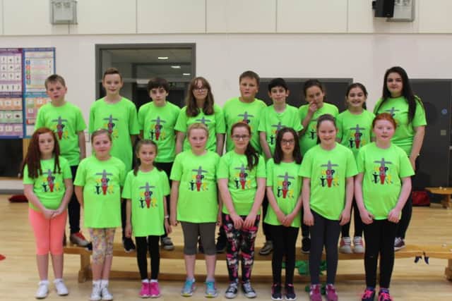 Some of the young people who took part in the Hope Camp wearing their special T-shirts.