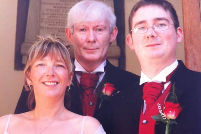 Christopher Sherrard with his father Wilson and mother Ann.