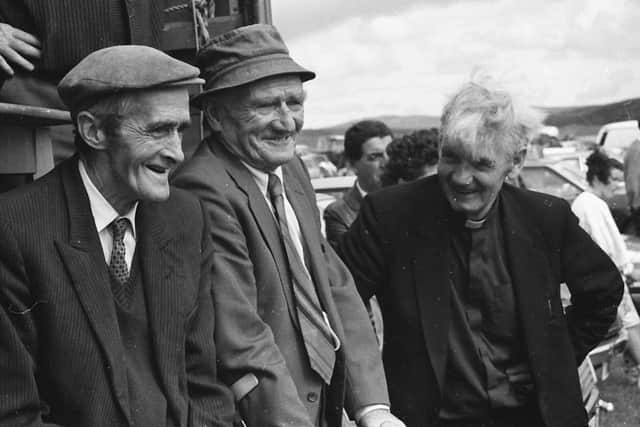 Phil Doherty, Desertegney, Buncrana (on left), and Owen Doherty (Clonmany) share a joke with Rev. Joseph Morris, Clonmany Show president, at the annual show.