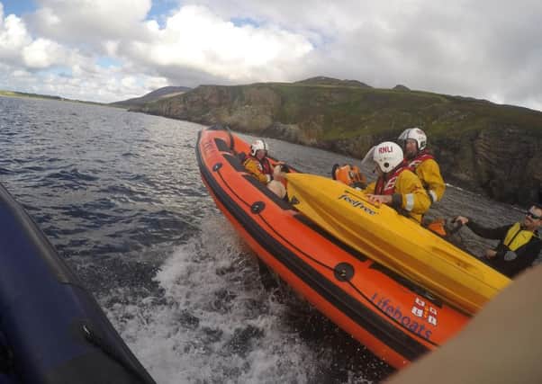 Lough Swilly RNLI pictured with the rescued sheep on their lifeboat.